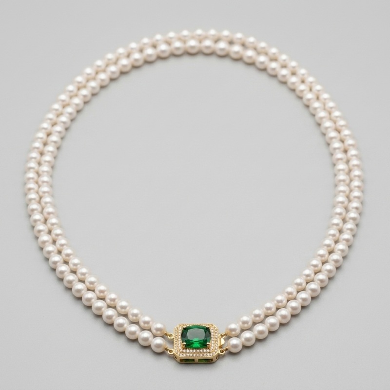 Elegant Double-Strand AAA Pearl Necklace with Emerald-Green Sapphire Clasp - Image 1